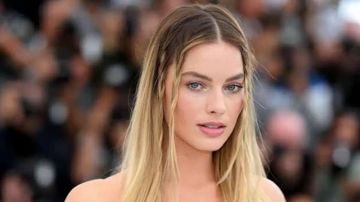 Margot Robbie’s Stylish Odyssey Unveiled: ‘Barbie: The World Tour’ Fashion Book Set to Mesmerize