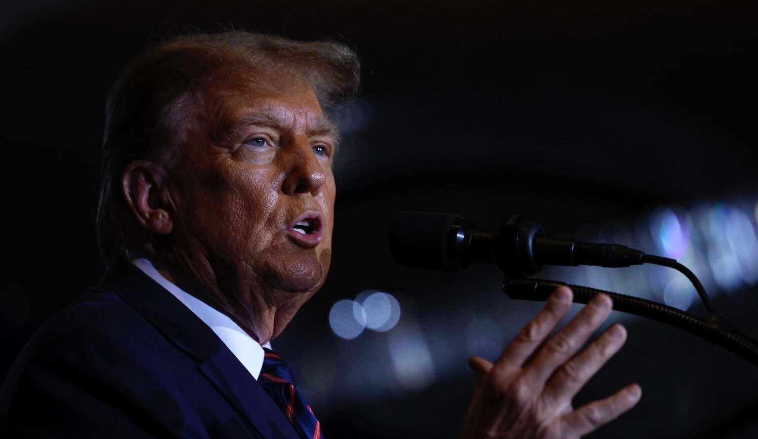 NASHUA, NEW HAMPSHIRE - JANUARY 23: Republican presidential candidate and former U.S. President Donald Trump delivers remarks during his primary night rally at the Sheraton on January 23, 2024 in Nashua, New Hampshire. New Hampshire voters cast their ballots in their state's primary election today. With Florida Governor Ron DeSantis dropping out of the race Sunday, former President Donald Trump and former UN Ambassador Nikki Haley are battling it out in this first-in-the-nation primary. (Photo by Chip Somodevilla/Getty Images)