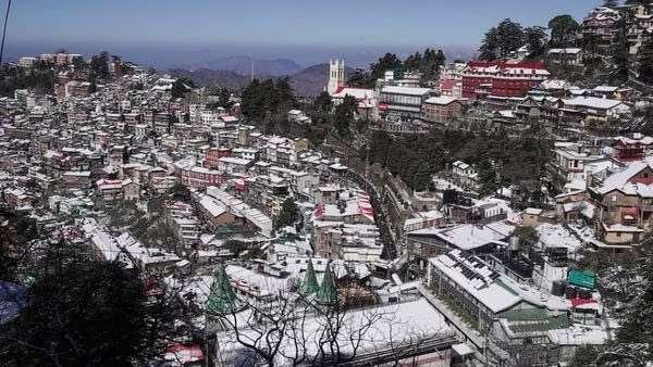 “Snowfall Splendor: Himachal Pradesh Embraces Winter’s White Magic Amidst Orange Alert”